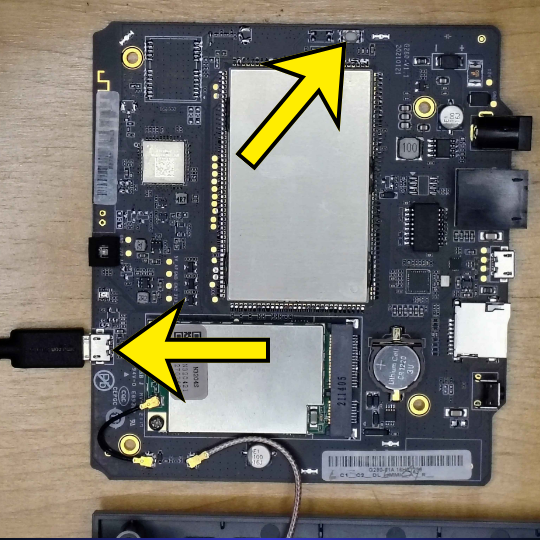 The micro USB cable in the internal FLASH USB port (left arrow) and the single Recovery button (top arrow) you will hold next
