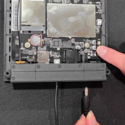 Holding the Recovery button while plugging in power to the Bobcat 300