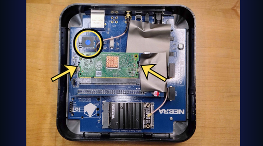 Nebra opened — the CM3+ compute module locking tabs and the eMMC Key location