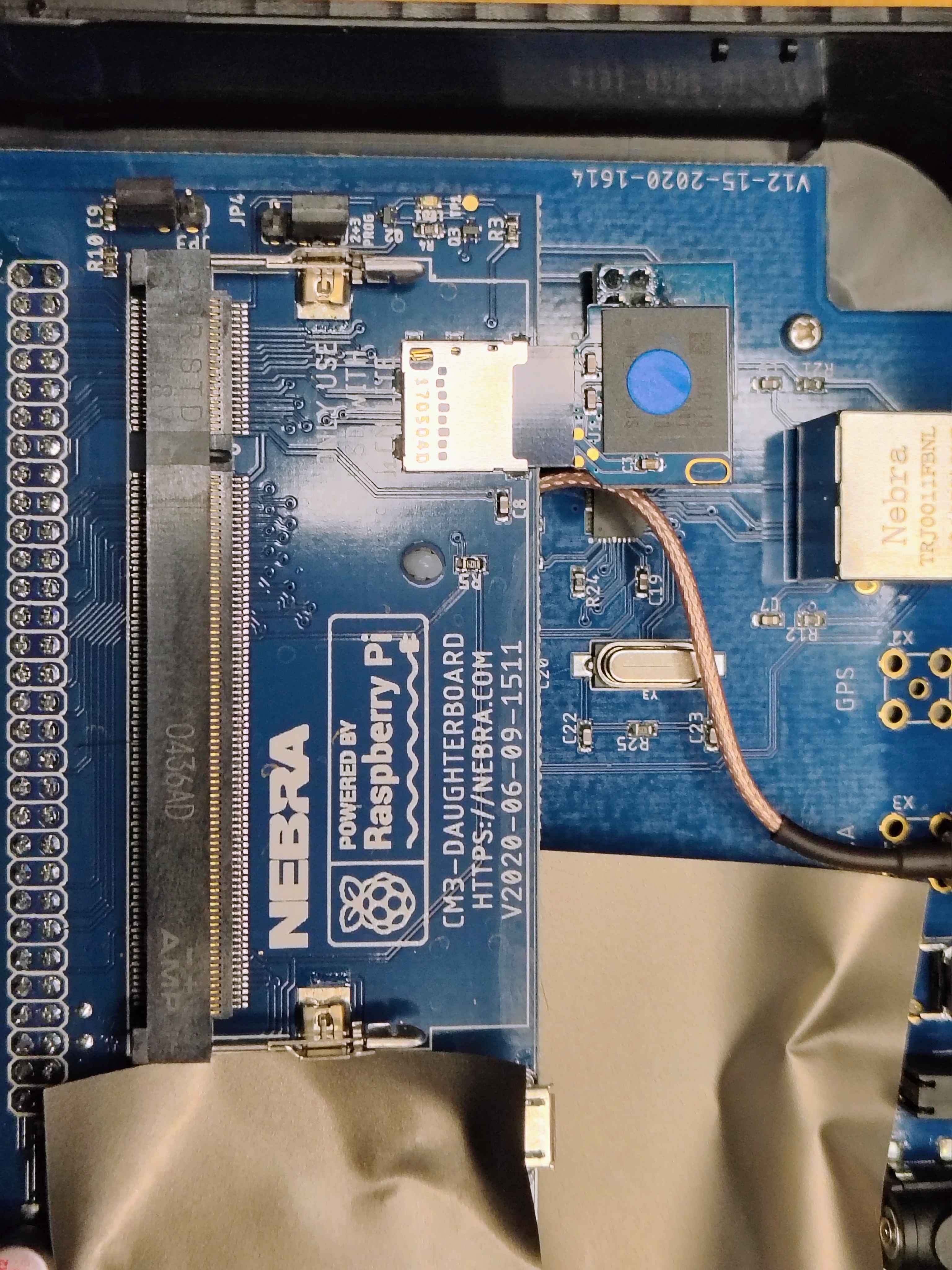 The Nebra eMMC Key slot on the CM3 daughterboard, with the ECC identity chip beside it
