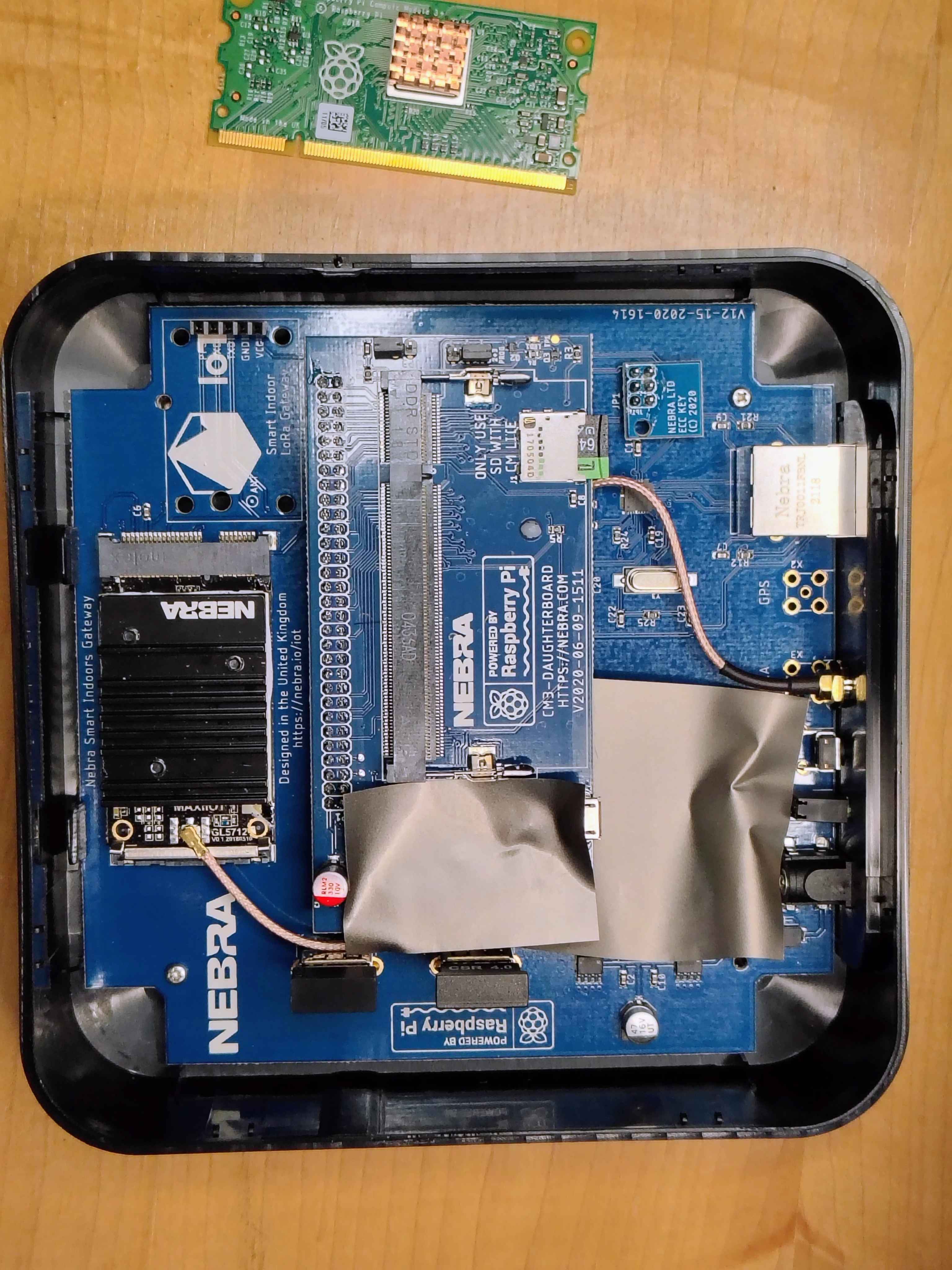 The freshly-flashed card seated in the eMMC Key slot on the daughterboard