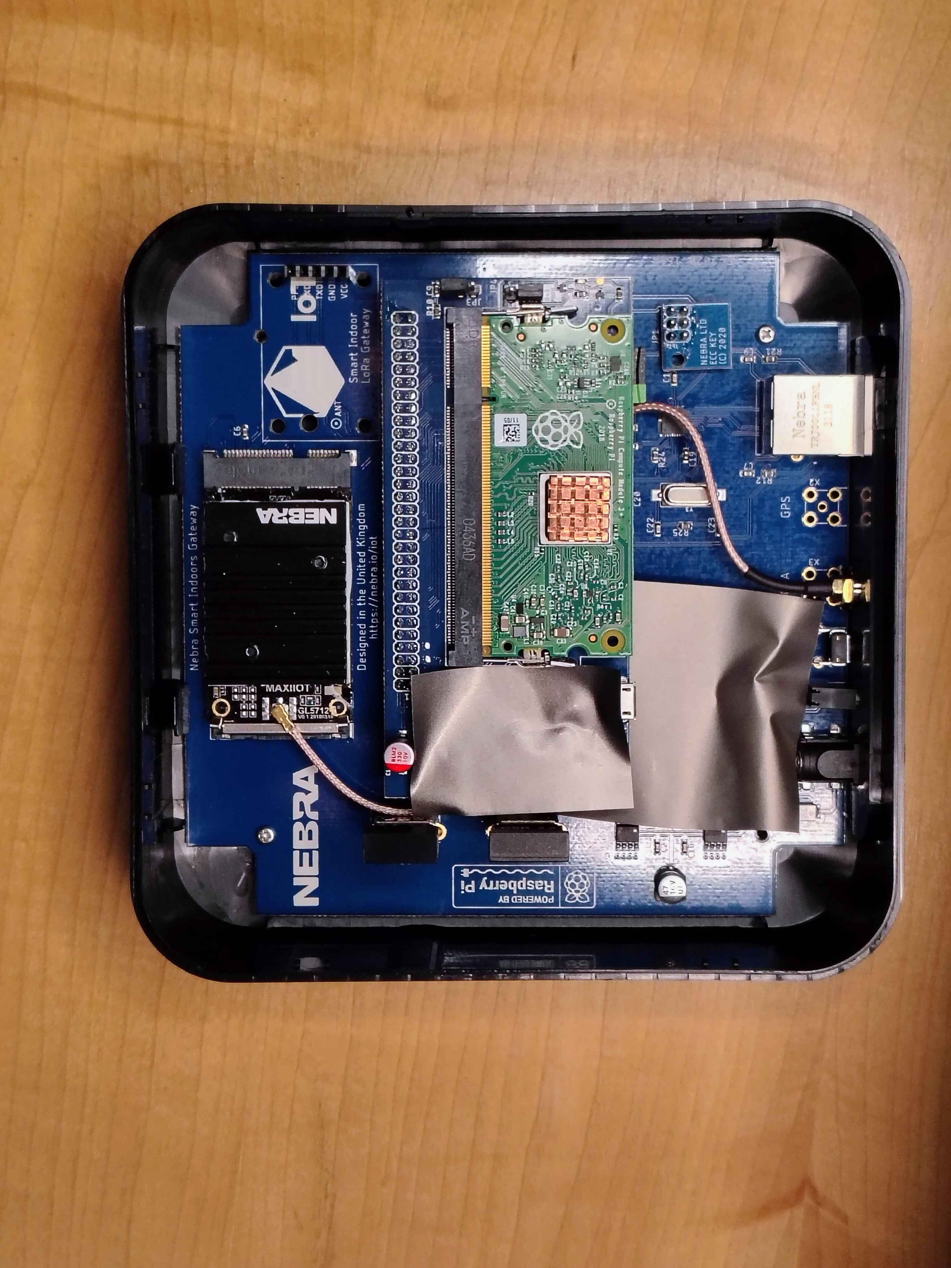 The CM3+ compute module reinstalled and latched by both metal tabs