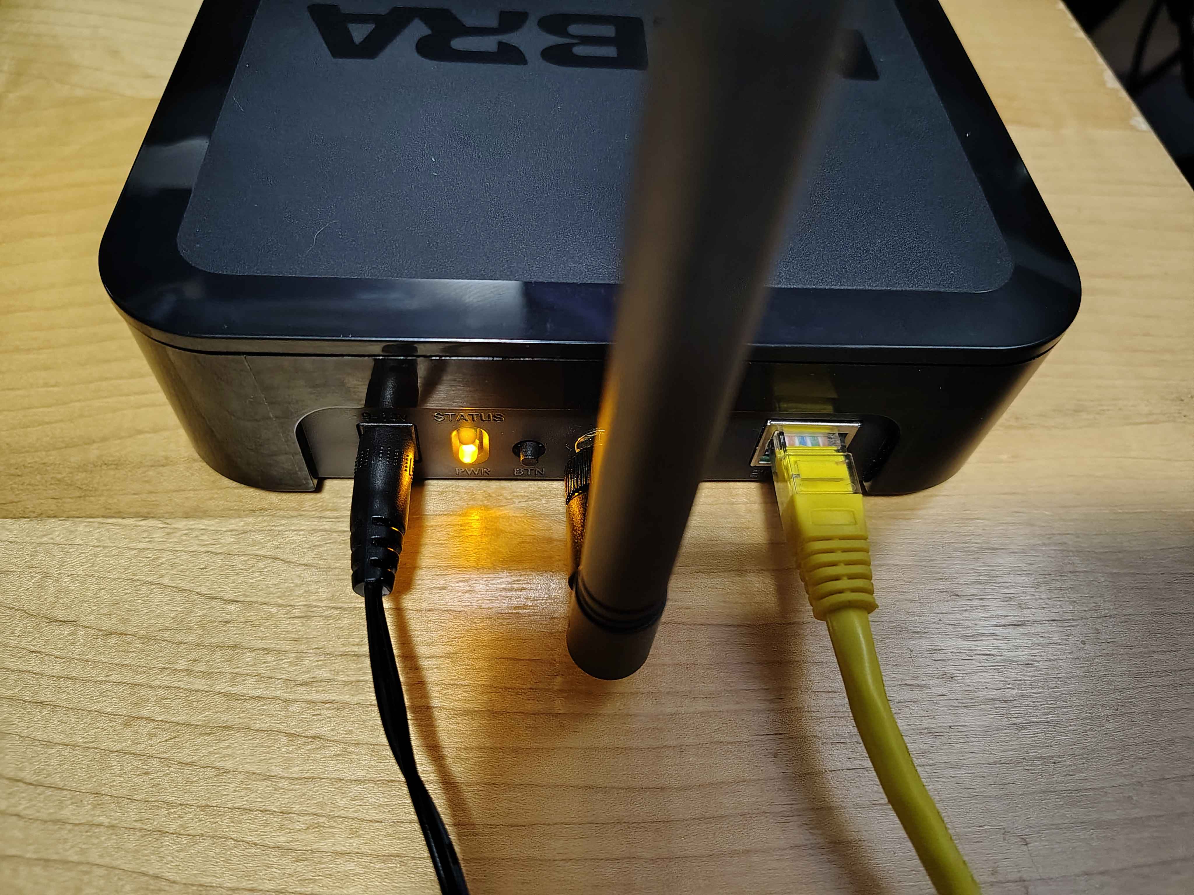 The reassembled Nebra powered on with power, antenna, and network cable connected