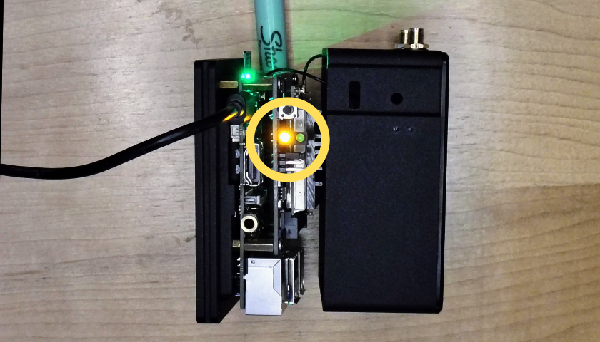 Nebra powered on and installing, yellow LED lit