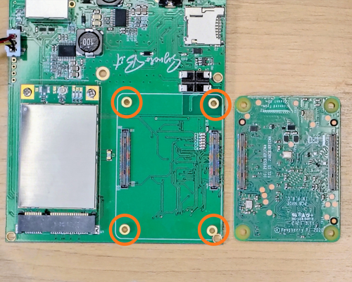 Check that all 4 brass spacers are in place on the SyncroBit carrier board before seating the CM4