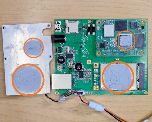Clean off the old thermal compound and apply a light coat to the CM4 processor and LoRa card and the matching spots on the heatsink